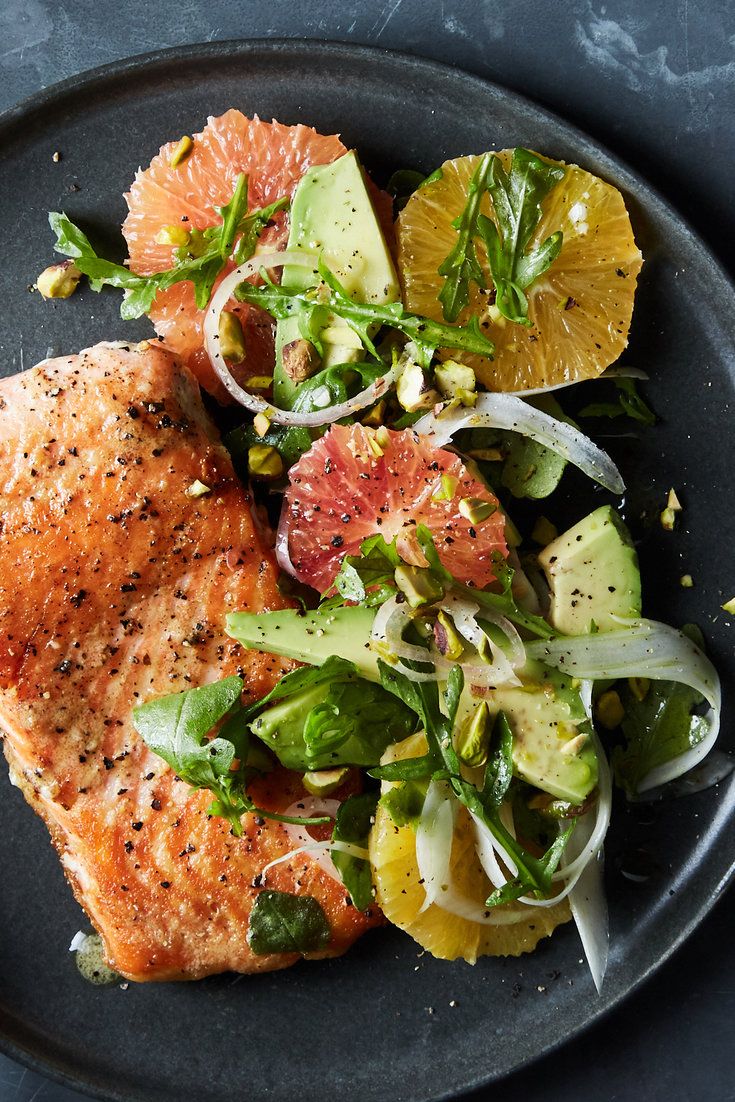 a close up of a plate of food with fish