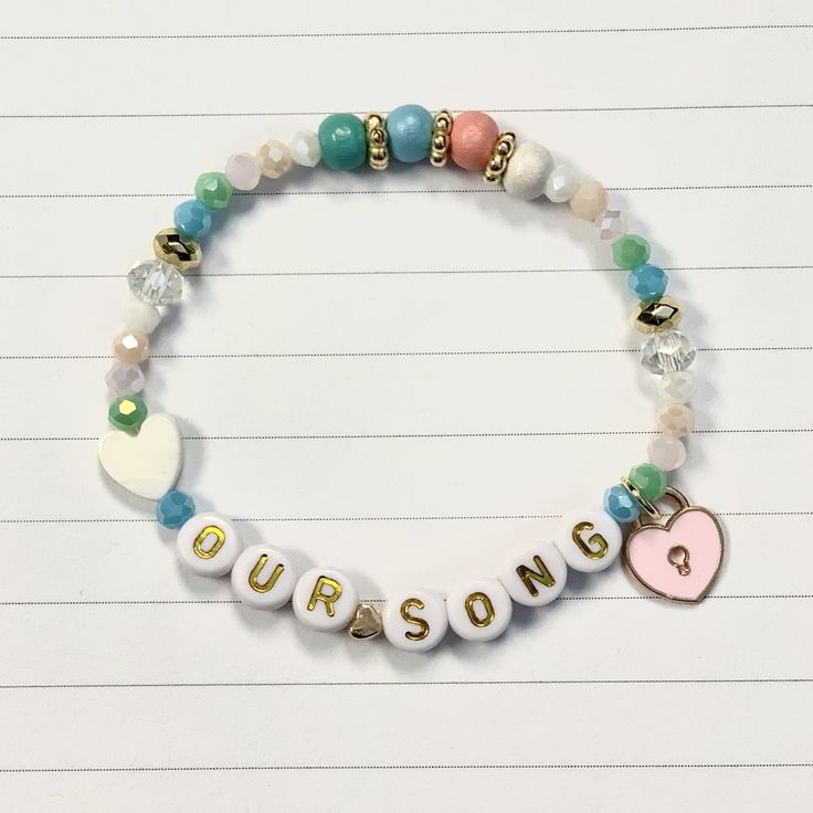 a beaded bracelet with the words,'i love my son'written on it