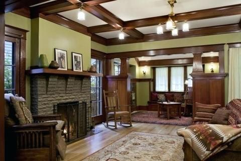 a living room filled with furniture and a fire place