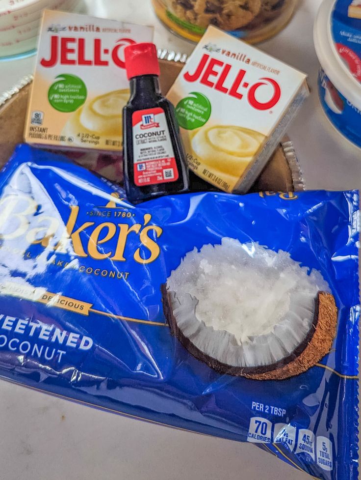 there are some snacks on the table with yogurt and other things to eat