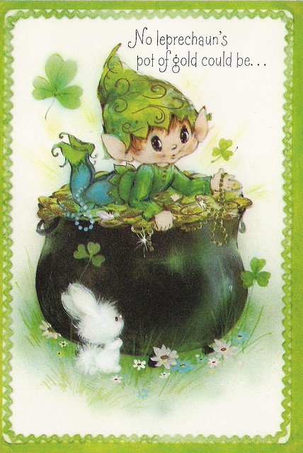 a card with a little boy sitting on top of a pot full of clovers