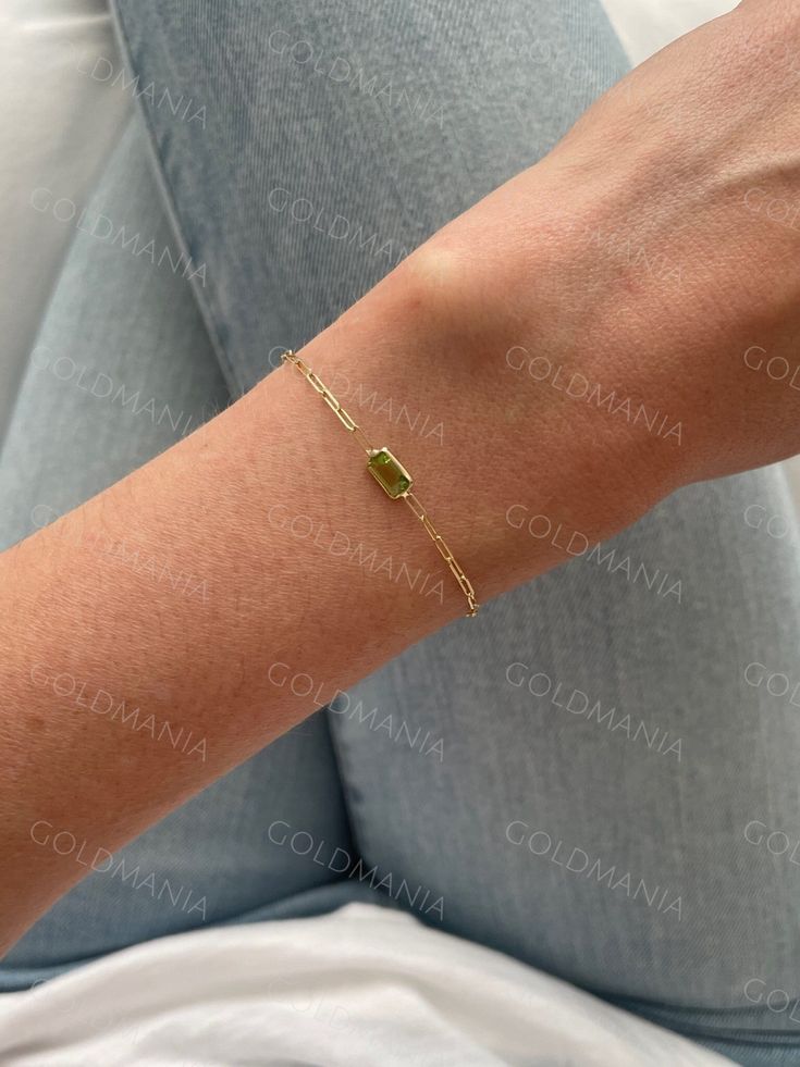 "All Our Bracelets Are Made Of REAL 14K GOLD  14K Yellow Gold Peridot Paperclip Link Chain Bracelet with Lobster Clasp, 7\" Inch, Real Gold Bracelet, Birthstone Bracelet, Women  Shop our 14K Bracelets https://www.etsy.com/shop/GOLDMANIA?ref=seller-platform-mcnav§ion_id=26925987  Shop On Sale items https://www.etsy.com/shop/GOLDMANIA?ref=seller-platform-mcnav§ion_id=1  Metal: 14K Yellow Gold   Width: 1.5 MM  Length: 7 IN  Closure: Lobster claw Weight: 2.50 Gram   Gemstone type: Peridot Gemstone s Modern Jewelry With Rectangular May Birthstone, Modern Rectangular May Birthstone Jewelry, Green Gold Plated Bracelet As A Gift, Fine Jewelry Gold Chain Bracelet With Gemstone, Gold Rectangular Jewelry With Bracelet Strap, Gold Jewelry With Gemstone In Rectangular Links, Gold Chain Bracelet With Gemstone For Gift, Gold Bracelets For May Birthstone, Green Minimalist Bracelet With Jubilee Design