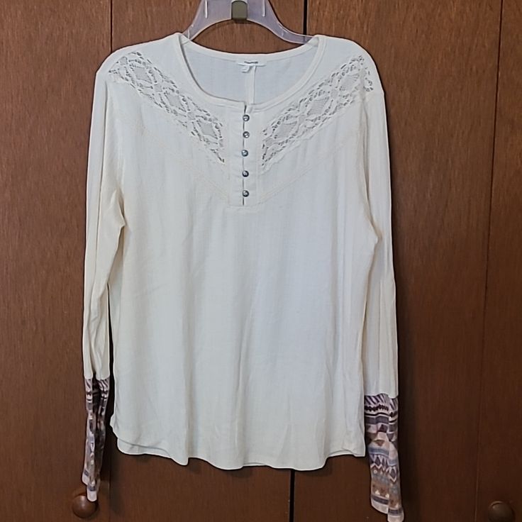 Nwt Maurices Shirt, Size Xl. Cream Color With Lace Accent At Front Neck, Colorful Cuffs. Pit To Pit 23 Inches, 26 Inches Long. Very Soft. T20 Off White Stretch Casual Top, Casual Off White Stretch Top, Casual Off-white Stretch Top, Pink Lace Shorts, Maurices Plus Size, Lace Short Sleeve Top, Yellow Tank Top, Blue Floral Blouse, Color Block Cardigan