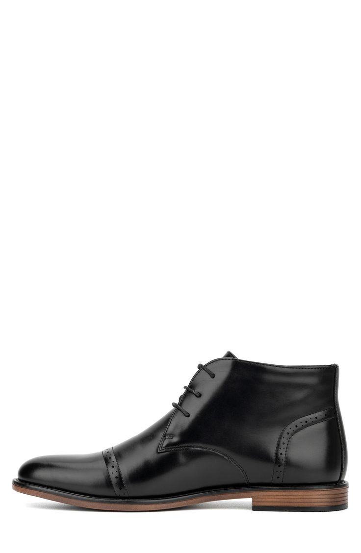 A brogue-detailed cap toe adds polished sophistication to this faux-leather derby. Cap toe Lace-up style Synthetic upper and lining/rubber sole Imported Elegant Wingtip Lace-up Boots For Business, Elegant Black Chukka Boots For Work, Classic Formal Lace-up Boots With Cap Toe, Elegant Business Wingtip Lace-up Boots, Elegant Business Lace-up Cap Toe Boots, Elegant Cap Toe Lace-up Boots For Business, Black Lace-up Boots For Formal Occasions, Elegant Lace-up Cap Toe Boots For Business, Formal Black Lace-up Boots