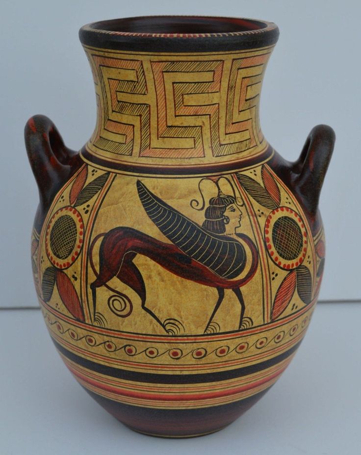 a vase with an animal painted on it