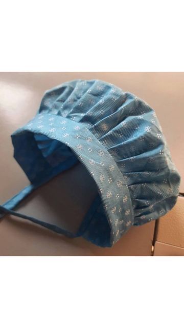 a blue bag sitting on top of a table