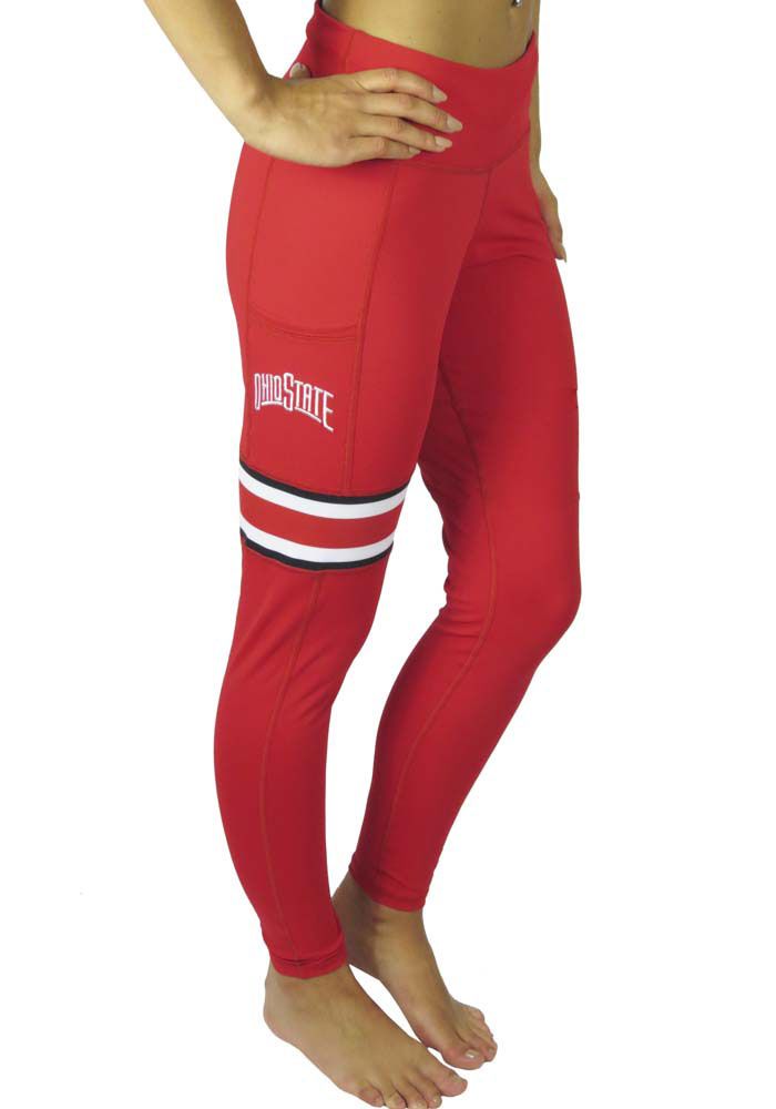 You'll be ready for your workout in these Ohio State Buckeyes Womens Red Pants. With a screen print team logo and name down left leg, these The Ohio State University Athletic Pants are a great way to show your Buckeyes pride at the gym! Dual blend fabrication, Polyester for wicking, Spandex for stretch, High rise, Full length, 90% Polyester - 10% Spandex, 4 Fitted Bottoms For Sports Season, Red Elastane Activewear For Gym, Red Elastane Activewear For Sports, Fitted Bottoms For Sports Events, Red Sporty Yoga Pants For Training, Red Full Length Yoga Pants For Sports, Stretch Red Gym Bottoms, Red Stretch Gym Bottoms, Red Stretch Sportswear Pants