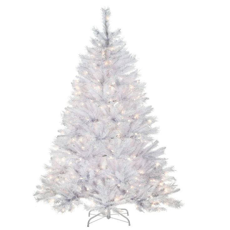 a white christmas tree with lights on it