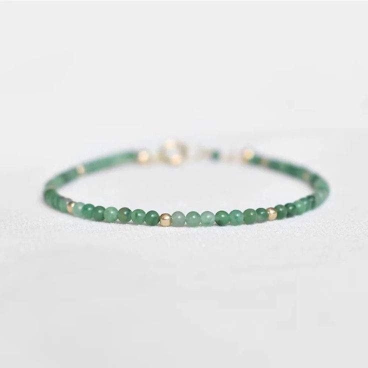 Embrace Serenity with Our Minimalist Jade Bracelet Elevate your jewellery collection with our exquisite minimalist jade bracelet, meticulously designed for the modern woman. Crafted with premium jade, this elegant piece embodies the perfect blend of simplicity and sophistication. The bracelet features a delicate gold chain, accentuating the natural beauty of the vibrant green jade crystal. Jade is renowned for its energy healing properties, offering a sense of tranquility and balance. Whether yo Jewelry Chain Types, One Piece Fashion, Couples Ring Set, Jade Crystal, Jewelry Chain, Daily Jewelry, Jade Bracelet, Minimal Jewelry, Ring Pendant Necklace