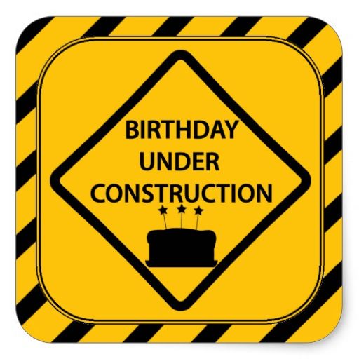 a birthday under construction sign on a white background