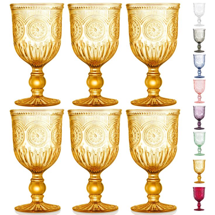 six gold goblets are lined up in different colors and sizes, each with an ornate design on the rim