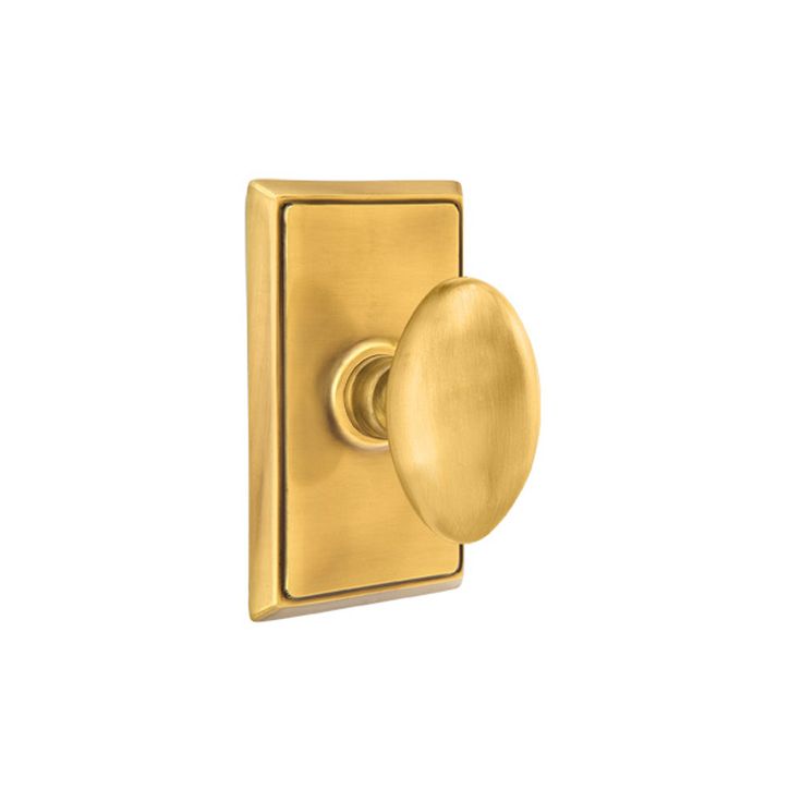 an image of a brass door handle on a white background