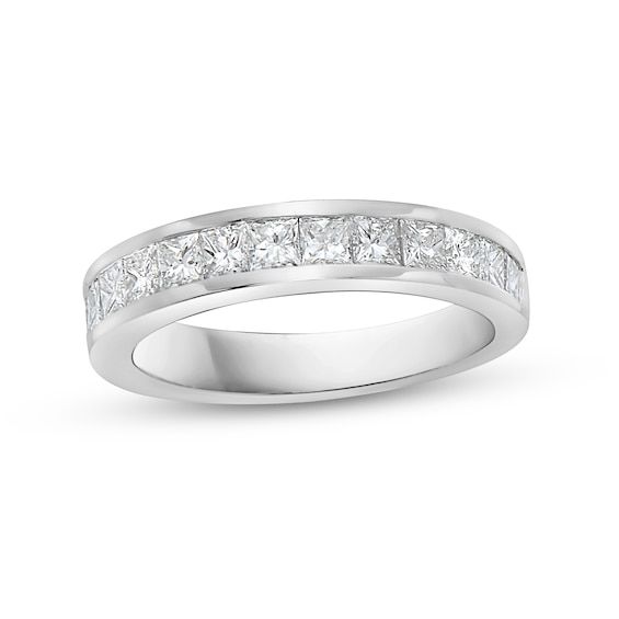 Update your bridal look with this classic 1-1/2 ct. t.w. princess-cut diamond anniversary band in white gold. Crafted in 14K white gold Channel-set princess-cut diamonds sparkle in a straight row. Wear this band alone or paired with a solitaire or other ring style. This anniversary band captivates with 1-1/2 cts. t.w. of diamonds. Princess Cut Eternity Band For Wedding, Wedding Princess Cut Eternity Band, Classic Wedding Ring With Tension Setting And Princess Cut, Princess Cut White Gold Ring For Anniversary, Classic Eternity Band With Princess Cut For Formal Occasions, Classic White Gold Princess Cut Wedding Ring, Princess Cut White Gold Wedding Ring For Anniversary, Classic Princess Cut White Gold Wedding Ring, Formal Princess Cut Eternity Band