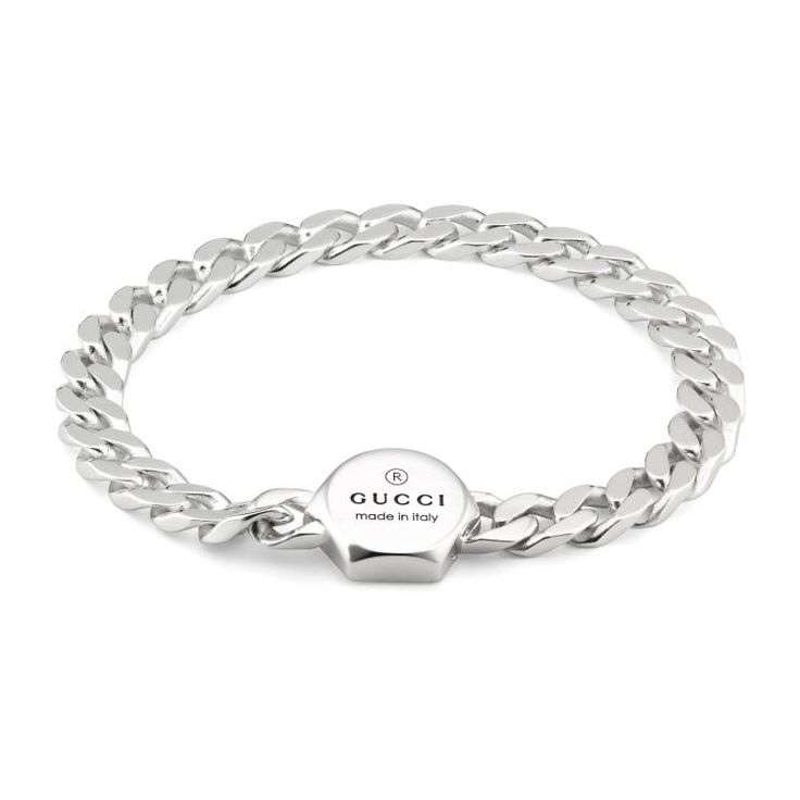 Crafted from 925 sterling silver, the Gucci trademark embossing defines this bracelet with a unique cassette closure. The intricate chain reflects the House's narrative, and further enhances the accessory. 925 sterling silver Gucci Trademark engraving Cassette closure Made in Italy Gucci Style #: YBA779173001018 Luxury Gucci Chain Bracelet For Gift, Silver Link Bracelet, Gucci Jewelry, Link Design, Jewellery Marketing, Unisex Bracelets, Latest Jewellery, Jewellery Collection, Jewelry Branding