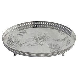 a silver tray with birds and flowers on the rim, sitting on a white background