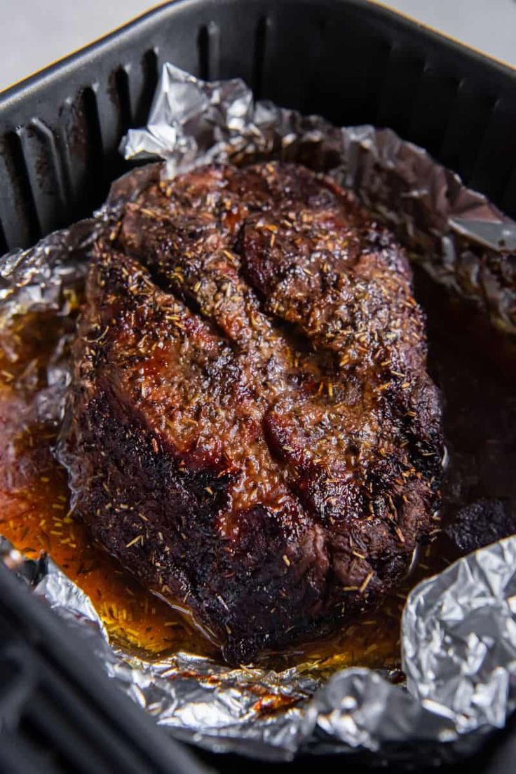 the steak is cooked in foil on the grill