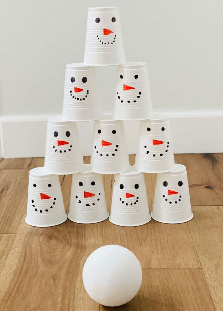 a group of cups that have been made to look like snowmen