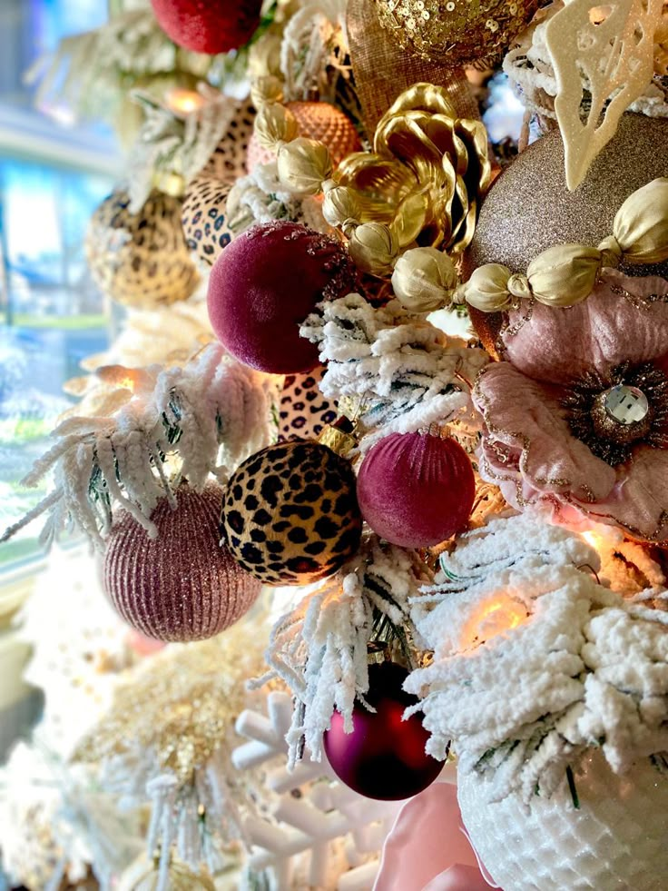 a christmas tree decorated with ornaments and lights