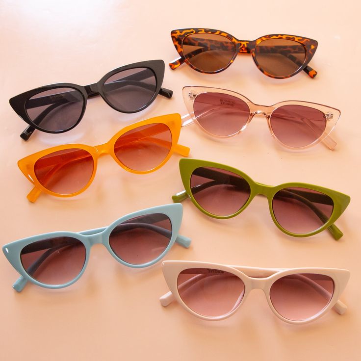 Introducing the Frenchie Sunglasses in the shade Fern. Add a touch of sophistication to any outfit with these adorable sunnies. Featuring a green hue and a wearable, everyday cat-eye shape, the Frenchie Sunglasses are a must-have addition to your accessory collection. Cat Eye Sunglasses With Gradient Lenses For Day Out, Casual Cat Eye Sunglasses For Summer, Vacation Cat Eye Plastic Sunglasses, Spring Cat Eye Sunglasses With Polarized Lenses, Retro Cat Eye Sunglasses With Polarized Lenses For Vacation, Retro Cat Eye Sunglasses With Polarized Lenses For Summer, Retro Polarized Cat Eye Sunglasses For Summer, Retro Polarized Cat Eye Sunglasses For Vacation, Cat Eye Plastic Sunglasses For Vacation