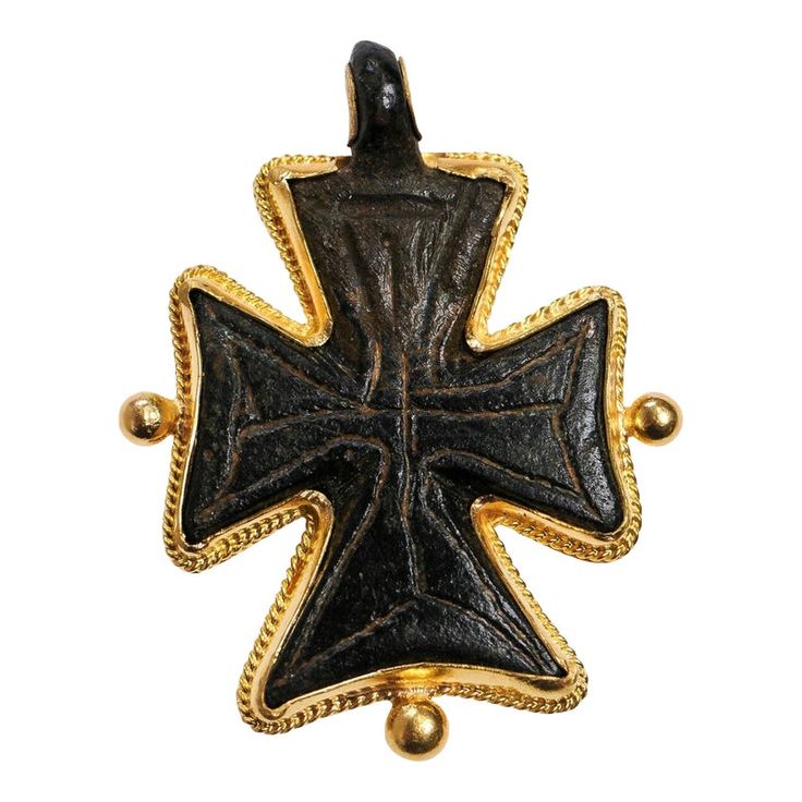 This is part of Chairish’s Fine Jewelry assortment.  A bronze cross pendant from the Byzantine Era trimmed with 21K gold. This bronze cross was likely created by lost wax casting and then further decorations are hand chiseled. The Byzantine Era ran from the 300s to the fall of Constantinople and the Eastern Roman Empire in the 1450's, at which time, the area fell to the Ottoman Empire. The vast area of Byzantium spanned from the Mediterranean coast of Italy to Eurasia. Byzantine Cross Jewelry For Ceremonial Occasions, Eastern Roman Empire, Byzantine Cross, Fall Of Constantinople, Coast Of Italy, Eastern Roman, Mediterranean Coast, Wax Casting, Lost Wax Casting