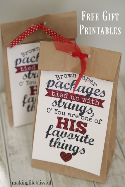 two brown paper bags with red ribbon tied around them and the words free gift printables