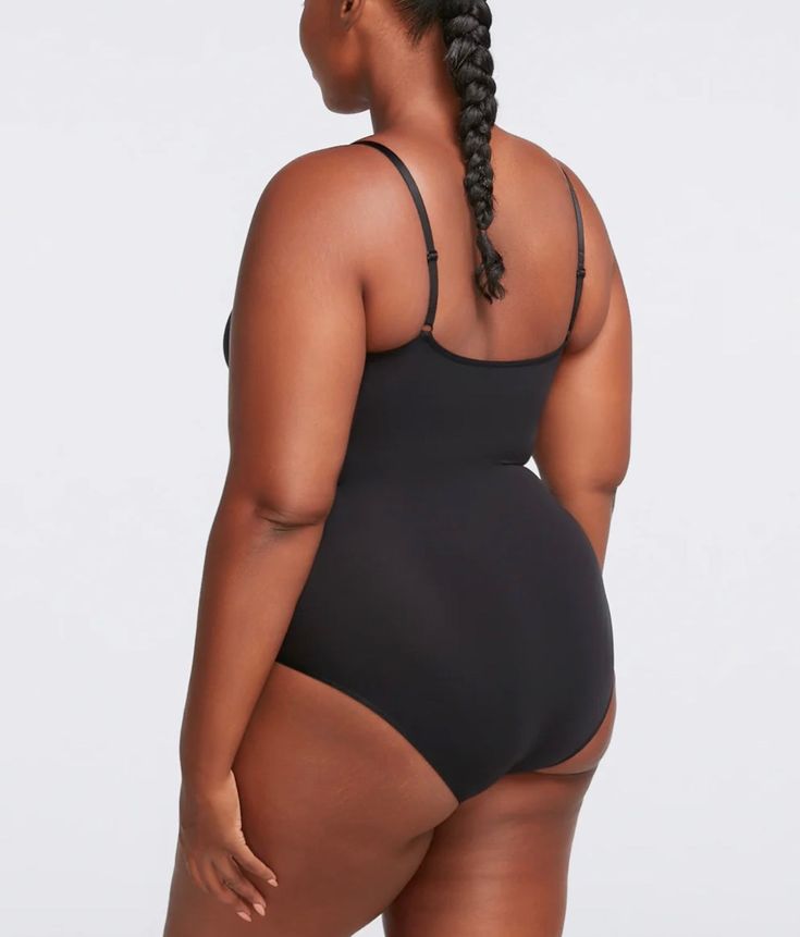 Discover the ultimate in comfort and confidence with our Curvy Perfect Smoothing Bodysuit Shaper. Crafted for all-day wear, this shapewear is designed with whisper-light material and a seamless, smooth fit to reduce bulges and enhance your natural silhouette. Say goodbye to discomfort and hello to a sleeker you! Shop now for the most comfortable shapewear you'll ever wear. Product Details: Material: 77% Nylon + 23% Spandex Convenience: Eye and hook closure for easy bathroom access Custom Fit: Ad Full Coverage Shapewear With Built-in Bra For Loungewear, Solid Color Smoothing Shapewear Bodysuit, Micro-elastic Shapewear With Built-in Bra, Seamless Underwire Stretch Shapewear, Stretch Shapewear With Seamless Construction And Underwire, Seamless Stretch Underwire Shapewear, Seamless Full Coverage Second-skin Shapewear, Seamless Second-skin Shapewear With Full Coverage, Seamless Stretch Shapewear With Underwire