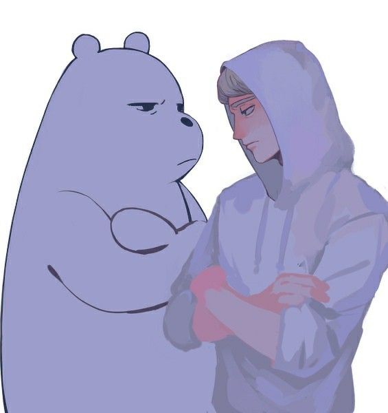 a man standing next to a cartoon bear