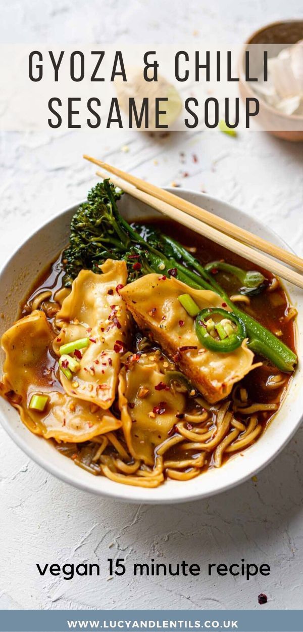 vegan gyoza and chilli sesame soup in a bowl with chopsticks