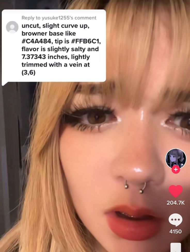 a girl with piercings on her nose has an instagram message to the camera