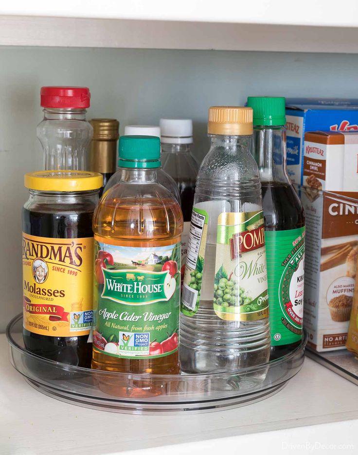 an open refrigerator filled with lots of different types of food and drinks on top of it