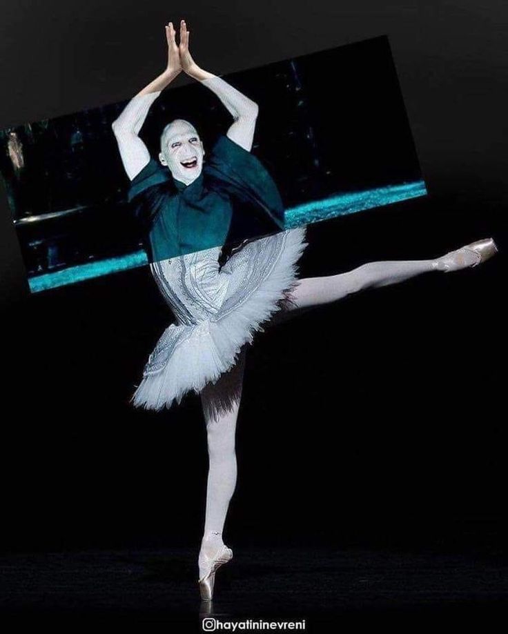 a ballerina in white tutu and green shirt doing a ballet move with her arms outstretched