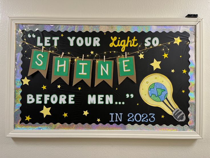 a sign that says let your light so shine before men in 2013 hanging on the wall