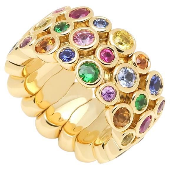 Multicolor Rainbow Sapphire Gemstone Bezel Eternity Band 18K Yellow Gold Ring Jewels inspired by the colourful Art Deco movement. Lively designs and colorful Interpretations in a triple row eternity band structure. 18 Karat Yellow Gold Genuine Sapphires, Gemstones & Tsavorites 5.00 CTW Sapphires, Gemstones & Tsavorites In-Stock Size 7-9 *The ring can stretch up to two sizes due to its flexible/extending structure, its stable size is 7 and can extend to any size range up to 9. Multi Color Sapphire Ring, Diamond Pendants Designs, Rainbow Sapphires, Round Sapphire, Art Deco Movement, 18k Yellow Gold Ring, Pendant Design, Sapphire Gemstone, Eternity Bands