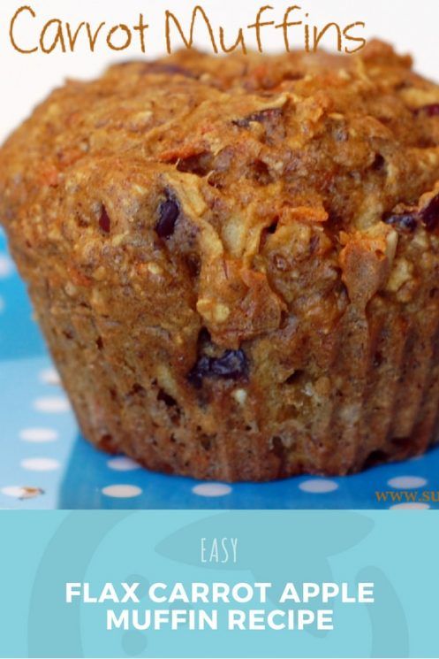 a close up of a muffin on a blue and white plate with the words carrot muffins