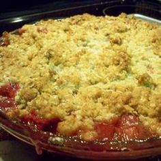 a close up of a pie in a pan on a stove