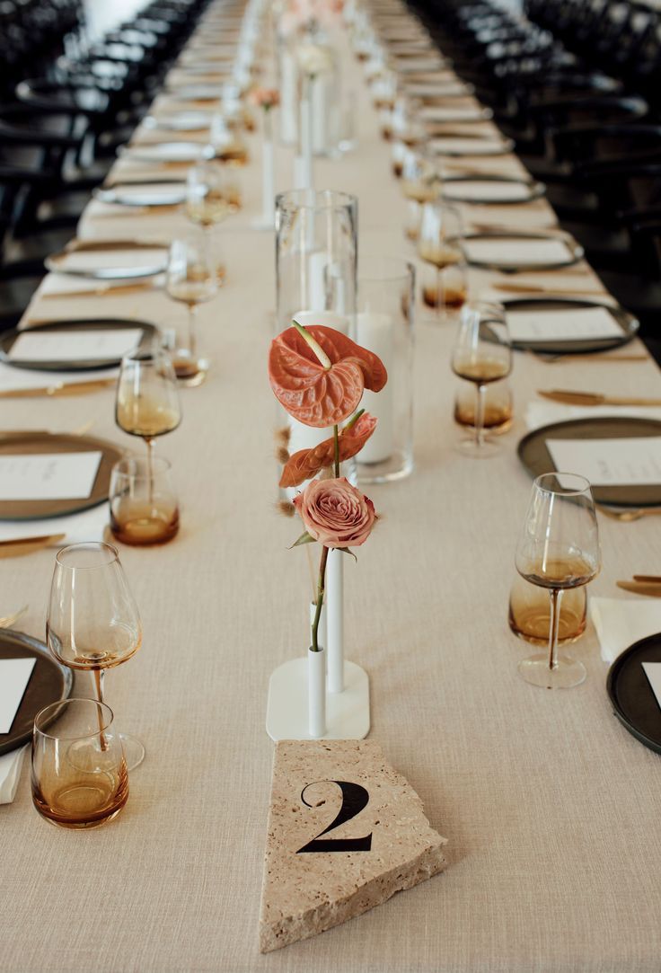 a long table is set up with place settings