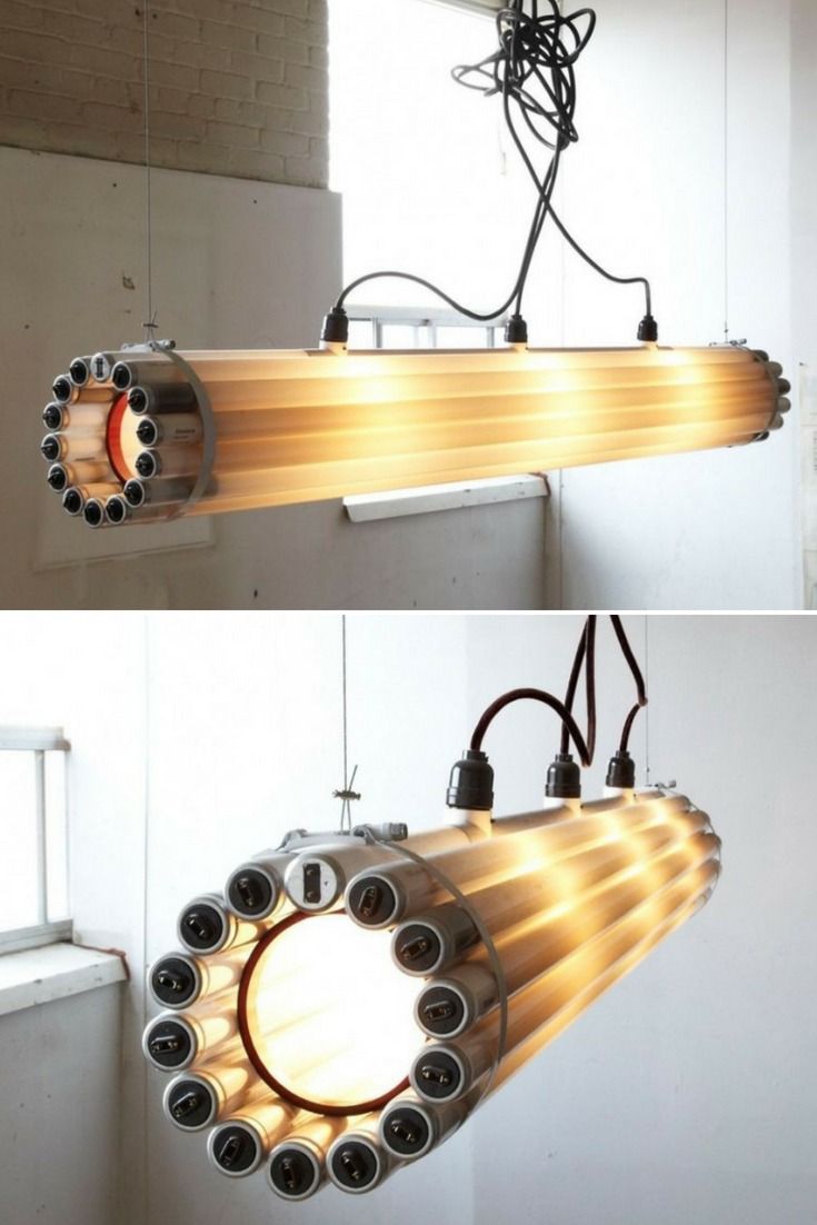 the light fixture is made out of pipes and wires