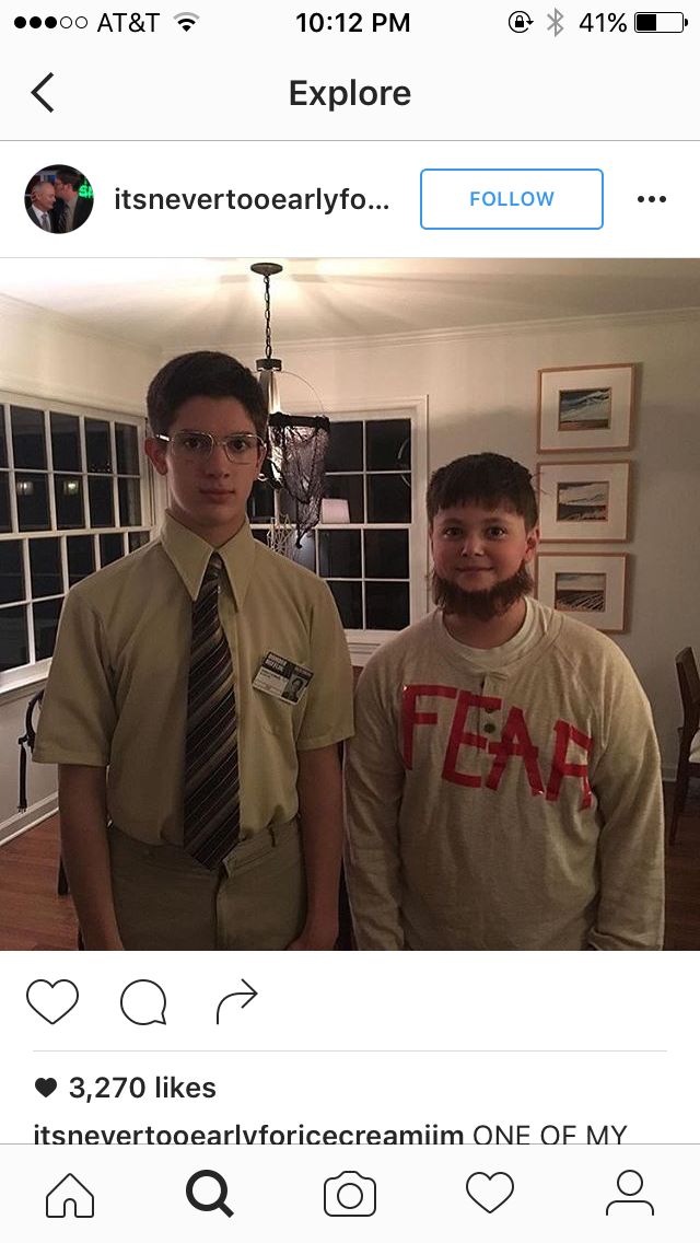 two young men standing next to each other