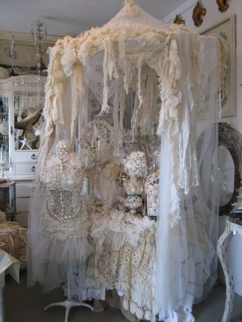 an old fashion store with lots of white items