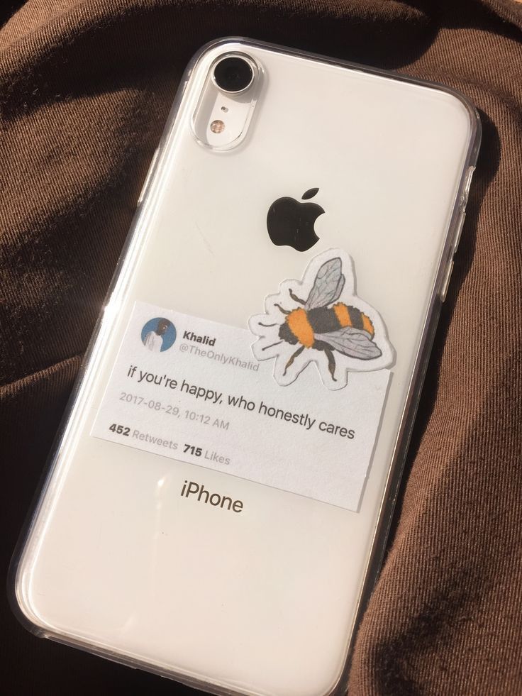 an iphone case with a bee sticker on it