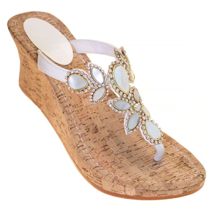 There is nothing quite like the combination of natural shells and cork. Our highest cork wedge was made for this style to give you the perfect beachy look. Take these with your on your next vacation! This sandal features a 3 inch cork wedge. split Hand-Made & Made to Order (2-3 weeks) 100% Leather Sole Lined with Suede For Added Comfort Embellished with Czech Crystals & Rhinestone Chain 3 Wedge Heights Available: 1.5 inches, 2.5 inches, 3 inches Use Our “Change A Wedge” Button To Select The Wed Mystique Sandals, Satin Ballet Flats, Nice Sandals, Crystal Sandals, Jeweled Sandals, White Wedges, Bridal Sandals, Rhinestone Chain, Wedges Style