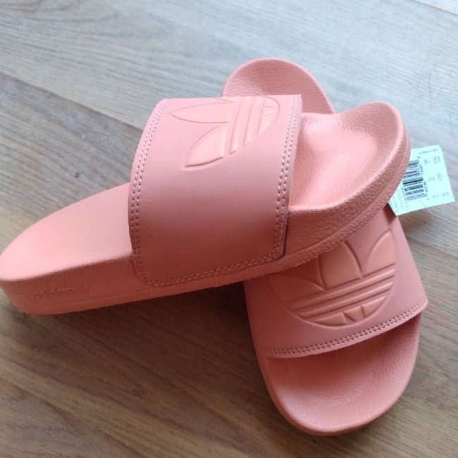 Women's Size 6.5 Or 7 In Women's Adidas Casual Slides For Spring, Adidas Non-slip Slides With Round Toe, Comfortable Pink Flat Sneakers, Trendy Pink Flat Slides, Pink Flat Slides With Rubber Sole, Pink Slip-on Slides With Rubber Sole, Pink Open Toe Slides With Rubber Sole, Trendy Pink Slides For Spring, Trendy Pink Round Toe Slides