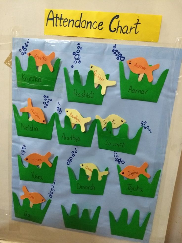 a bulletin board with paper cut out animals on it's sides and the words attendance chart