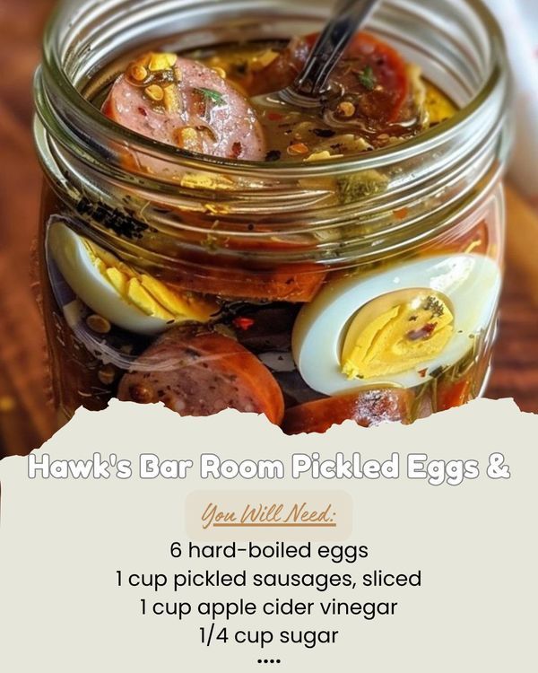 a jar filled with pickled eggs and meats