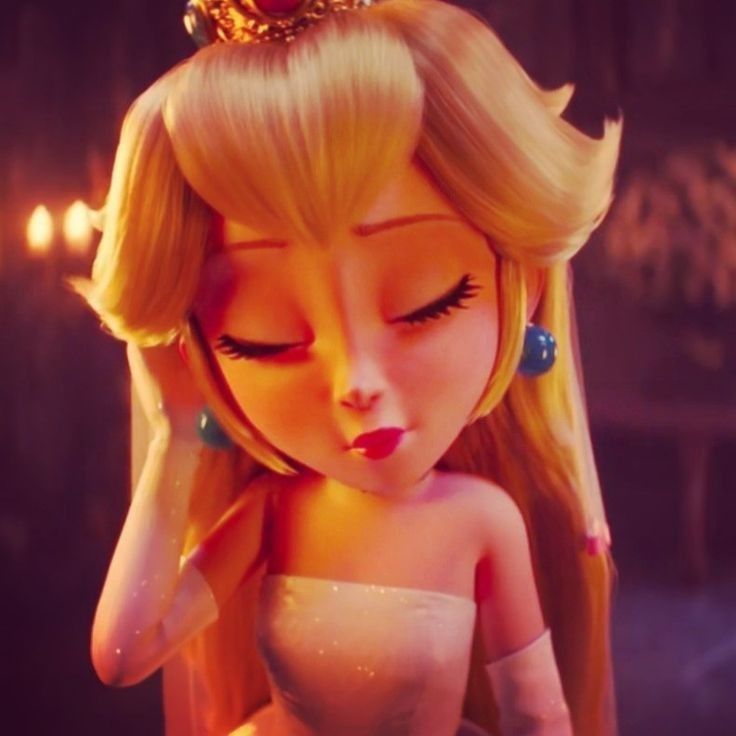 a cartoon girl with blonde hair wearing a tiara and holding her hand to her face