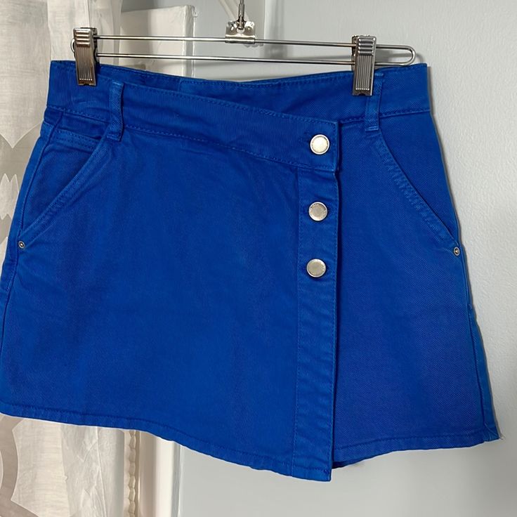 Zara Blue Skort (Skirt In Front, Shorts In Back Size Xs Stretchy 100% Cotton No Tags, Never Worn Short Blue Denim Skirt For Summer, Stretch Blue Mini Shorts, Blue Stretch Mini Shorts, Blue Mini Denim Skirt For Day Out, Zara Cotton Skirt, Blue Denim Stretch Skort, Trendy Blue Mini Length Bottoms, High-waist Blue Skirt For Day Out, Trendy Blue Mini Bottoms