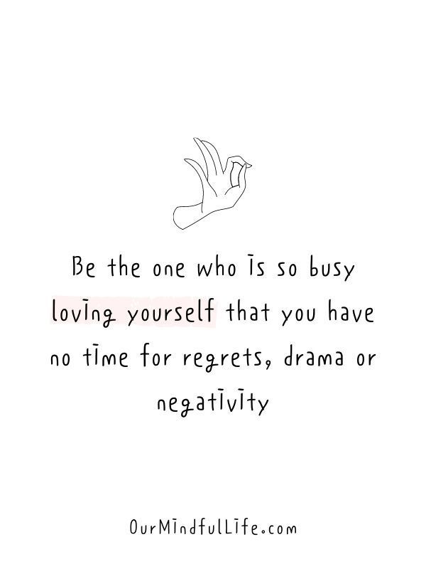 a hand with the words be the one who is so busy loving yourself that you have no time for regeits, drama or negativeity