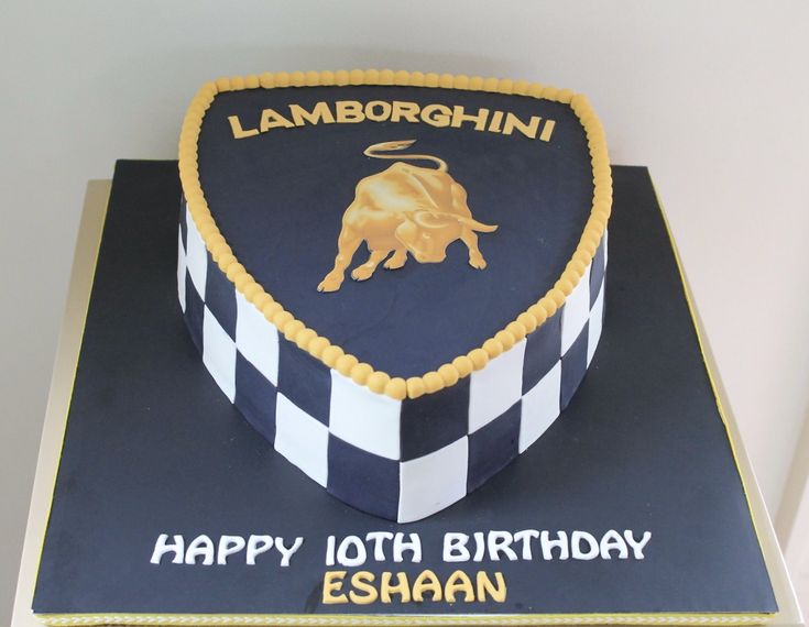 a birthday cake with an emblem on it