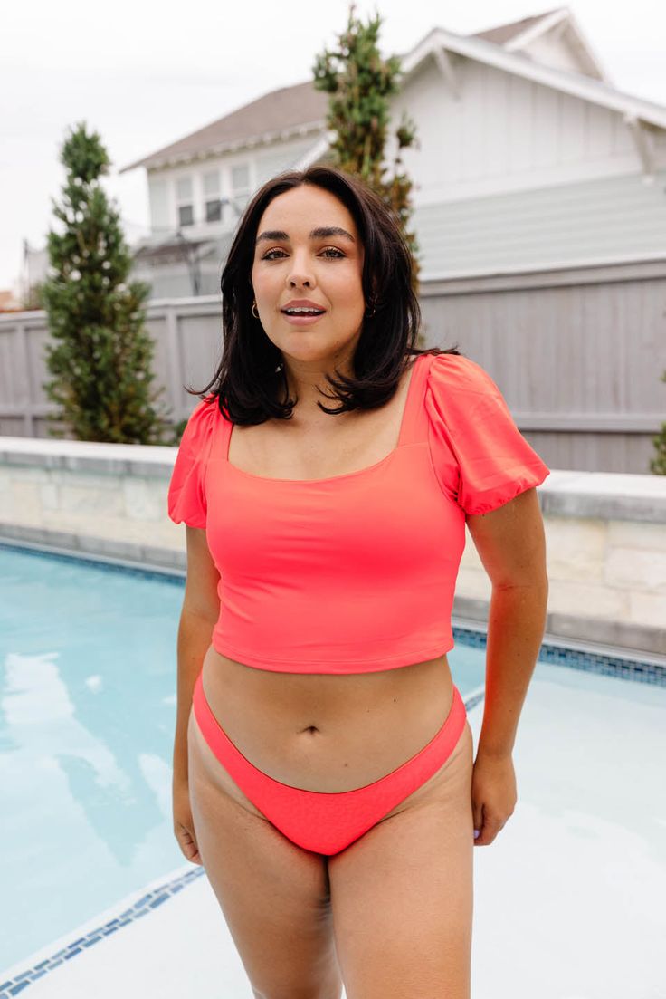 The most elegant crop you will EVER wear! This longer style crop has built-in medium support that meets our high-waisted bottoms for a one-piece look, with the convenience of a two-piece. Actual colors may vary. This is due to the fact that every computer monitor has a different capability to display colors and that everyone sees these colors differently. See our pictures on Instagram or Facebook for more angles and videos. Fitted Seamless Cropped Bottoms, Fitted Cropped Bottoms For Vacation, Spring Seamless Cropped Bottoms, Summer Cropped Bottoms For Poolside, Fitted Beachwear Bottoms For Brunch, Solid Seamless Cropped Bottoms, Seamless Solid Cropped Bottoms, Trendy Cropped Swimwear For Spring, Seamless Cropped Summer Bottoms