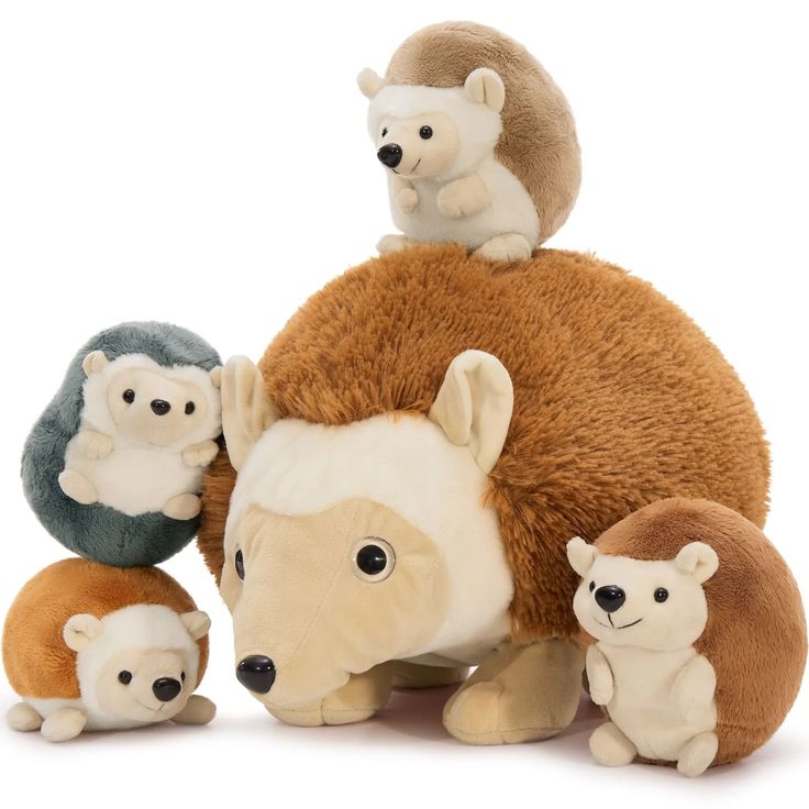 a stuffed animal with four smaller animals around it's neck, including an antelope and two hedgehogs